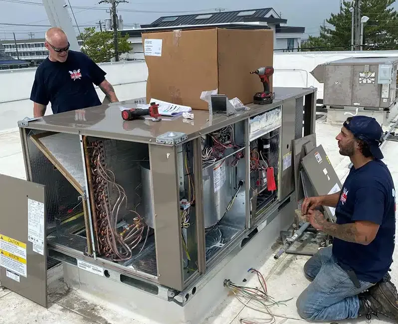 Image of NJ Pipe Dr plumber and HVAC tech in Woodbridge working on a commercial project