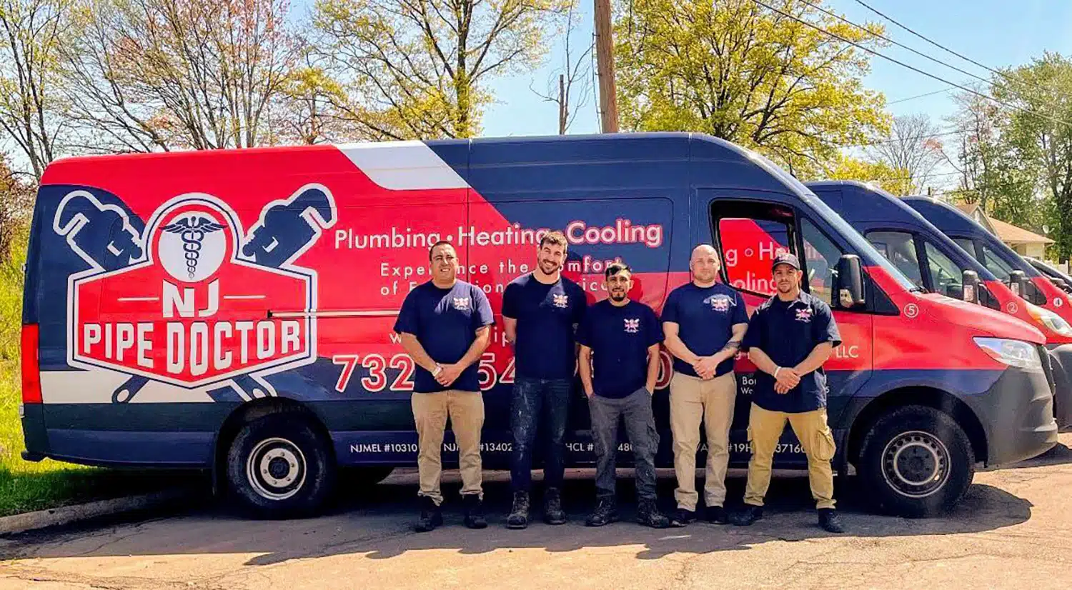 Image of NJ Pipe Dr technicians standing in front of van for HVAC and plumbing services in Berkeley Heights, NJ