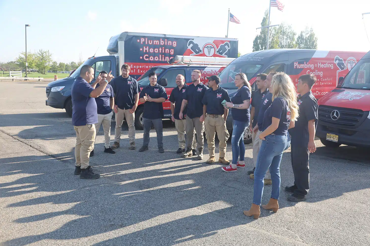 Image of NJ Pipe Dr team standing in front of van for HVAC and plumbing services in Woodbridge, NJ