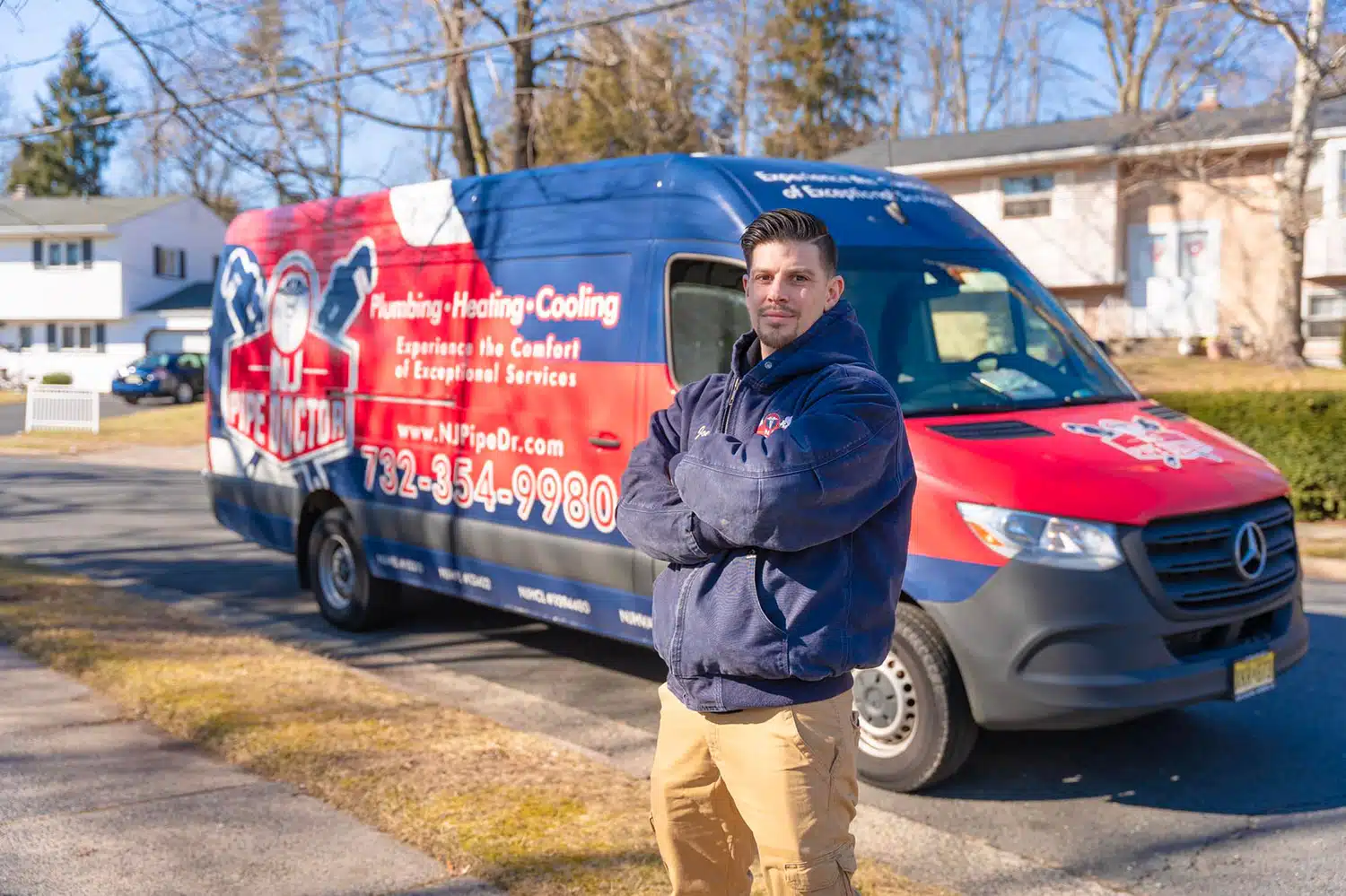 Image of NJ Pipe Dr technician standing in front of van for HVAC and plumbing services in Woodbridge, NJ